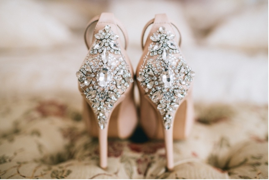 Bridal shoes are matched with the dress and other accessories.